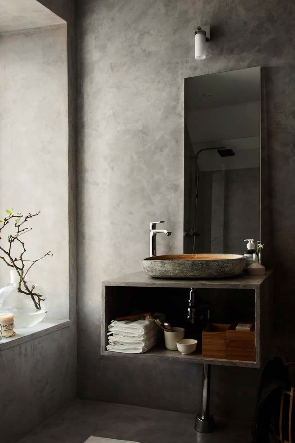 Seamless micro cement bathroom walls and vanity