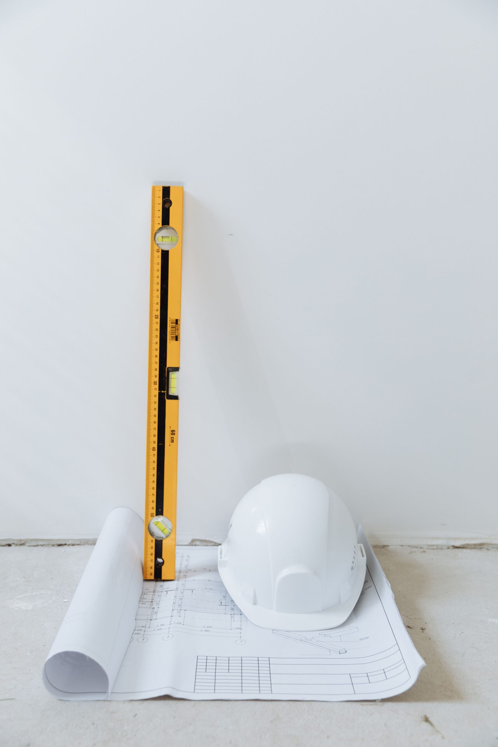 Construction project management Malta site planning with blueprints